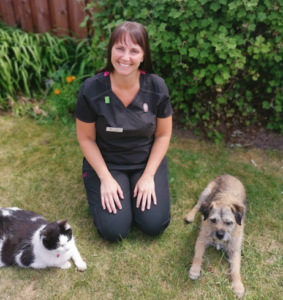 Sharon Davies picture with cat and dog