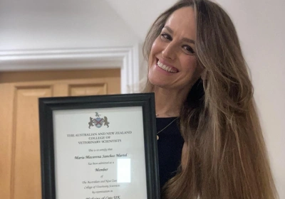 Macarena celebrates purr-fect results after achieve advanced practitioner status in feline medicine!